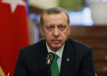 Turkish Prime Minister Recep Tayyip Erdogan attends a news briefing in a ceremony for signing agreements between Iranian and Turkish officials in Tehran, Iran, Wednesday, Jan. 29, 2014. Erdogan arrived in Tehran for talks with Iranian leaders on bilateral ties and regional issues including Syria. (AP Photo/Ebrahim Noroozi)