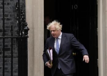British Prime Minister Boris Johnson leaves 10 Downing Street to attend the weekly Prime Minister's Questions at the Houses of Parliament, in London, Wednesday, May 25, 2022. A report into lockdown-breaching U.K. government parties says blame for a "culture" of rule-breaking in Prime Minister Boris Johnson's office must rest with those at the top. Senior civil servant Sue Gray's long-awaited report was published Wednesday. (AP Photo/Matt Dunham)