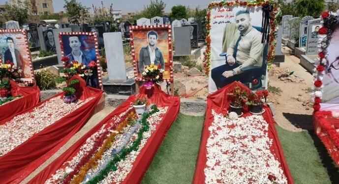 ‘Jin, jiyan, azadî’ direnişinde hayatını kaybedenlerin mezarlarına ziyaret