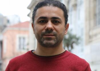 Gazeteci Yılmaz’ın kızı ile çektirdiği fotoğraf da iddianamede yer aldı