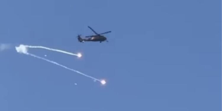 Askeri helikopterden kent merkezine mühimmat atıldı