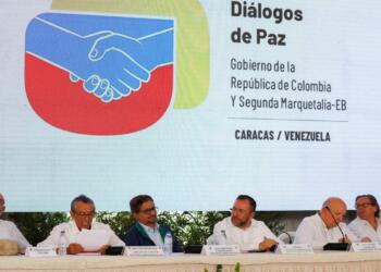 Representatives of Colombia's government and the Segunda Marquetalia armed group attend a press conference after the start of peace talks in Caracas, Venezuela, June 24, 2024. REUTERS/Leonardo Fernandez Viloria