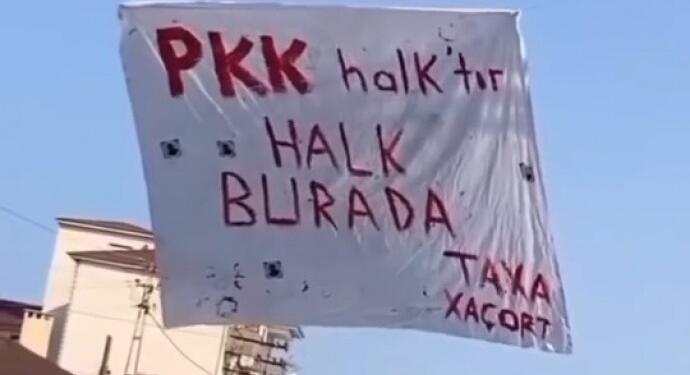 Wan’da ‘PKK halktır halk burada’ pankartı