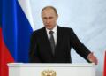 Russian President Vladimir Putin gives his annual state of the nation address in the Kremlin in Moscow, Russia, Thursday, Dec. 4, 2014. Russian President Putin has defended the Kremlin's aggressive foreign policy, saying the actions are necessary for his country's survival. (AP Photo/Pavel Golovkin)
