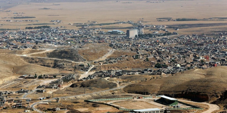A picture taken on August 17, 2015 shows a general view of the northern Iraqi town of Sinjar, west of the city of Mosul.  AFP PHOTO / SAFIN HAMED (Photo by SAFIN HAMED / AFP)